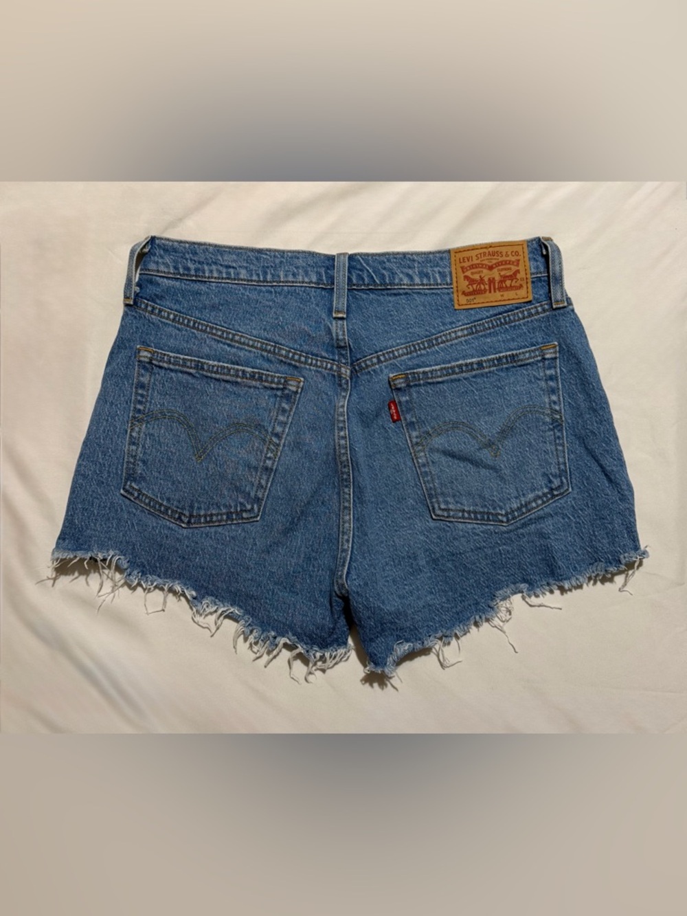 Levis Medium Blue Distressed Denim Jean Shorts